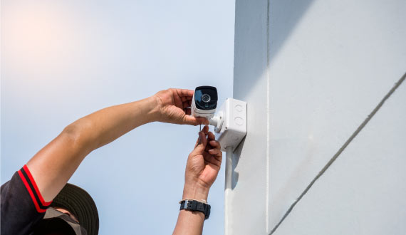 A technician installing cctv
