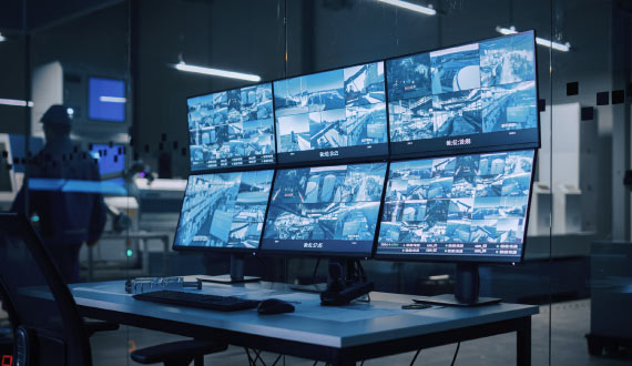 Security Guard monitoring cctv camera
